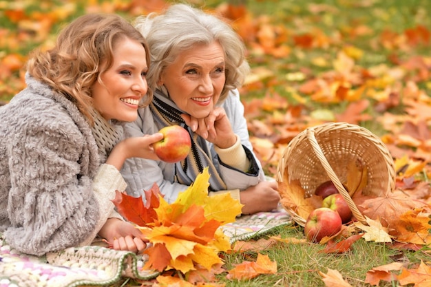 Portrait of two beautiful women posing outdoors