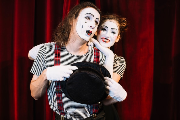 Photo portrait of two lovely mime artist performer