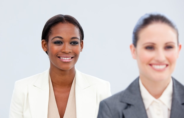 Portrait of two radiant businesswomen 