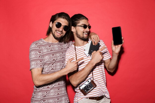 Portrait of a two young excited twin brothers