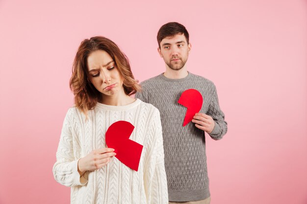 Portrait of an upset couple dressed in sweaters