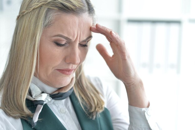 Portrait of upset mature woman close up