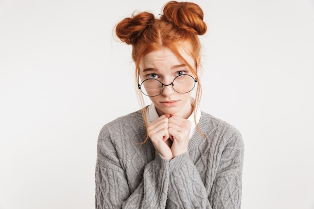 Portrait of an upset young school nerd woman