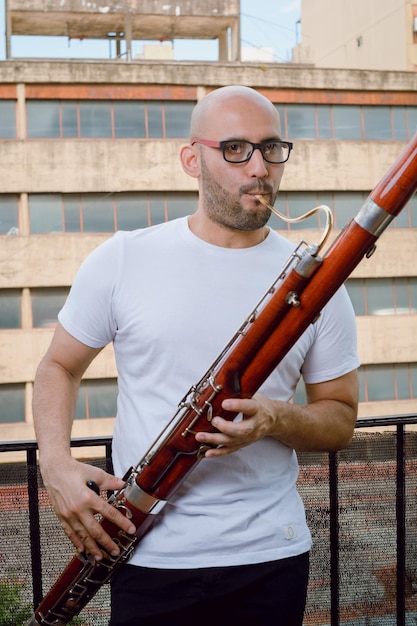 Portrait of a Venezuelan man musician of the Simon Bolivar Symphony Orchestra at homen