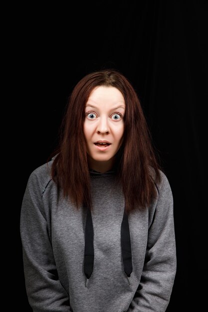 Portrait of a very surprised woman