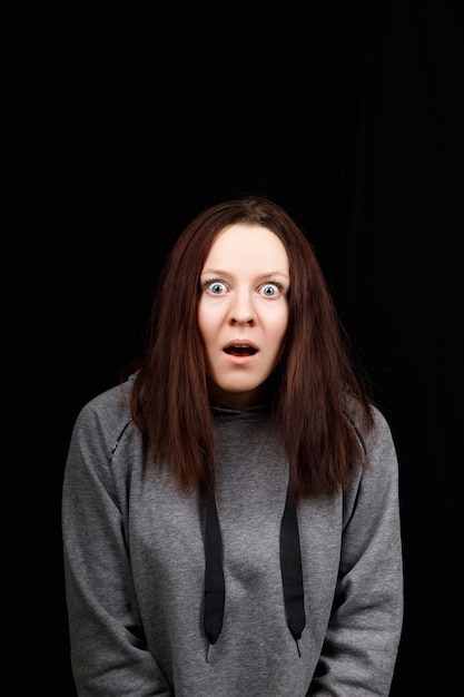 Portrait of a very surprised woman