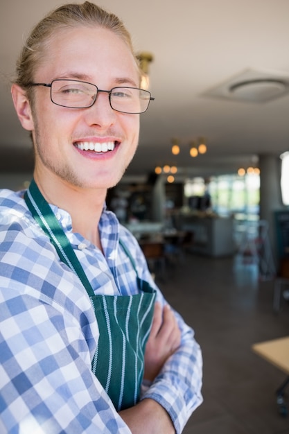 Portrait of waiter smiling