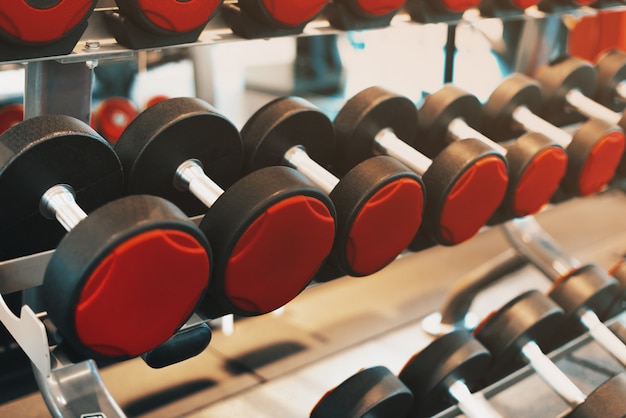 Portrait of weights in a gym during day time, morning sport routine