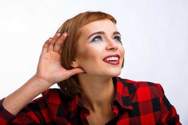 Photo portrait with different happy emotions lady holds hand near ear listen carefully