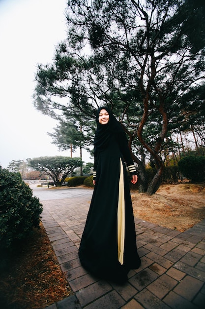 portrait of woman against tree