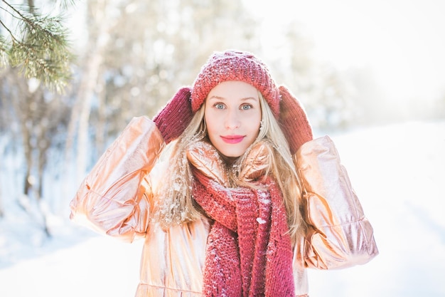 portrait of woman against trees on snowy field