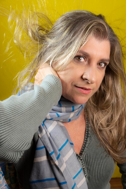 Portrait of a woman against yellow background salvador bahia brazil