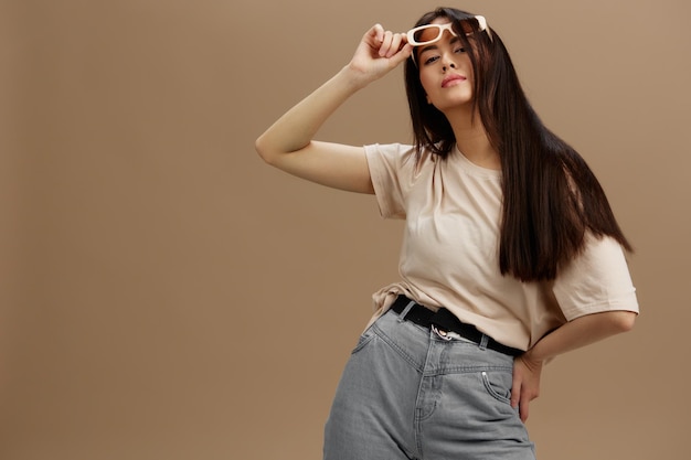 portrait woman attractive look charmin dark glasses in a tshirt studio model high quality photo