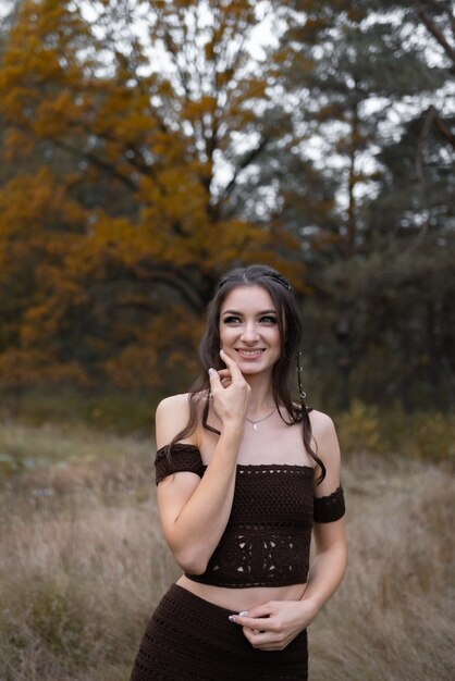 Portrait of a woman in the autumn forest