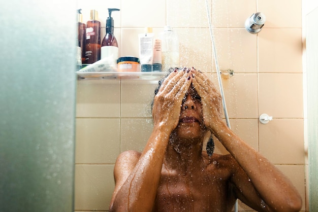 Photo portrait of a woman in the bathroom washing herself