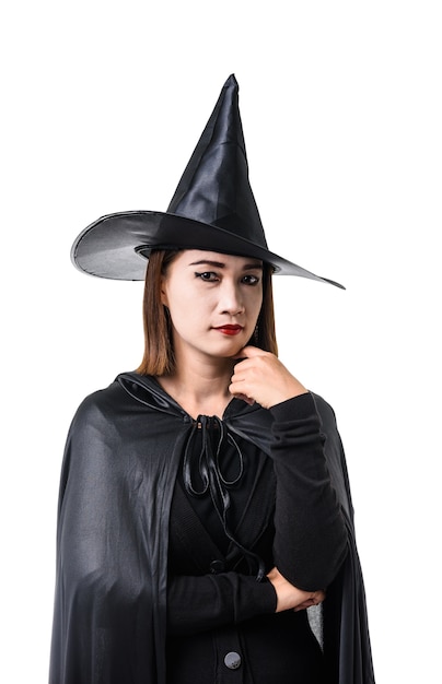 Portrait of woman in black Scary witch halloween costume standing with hat 