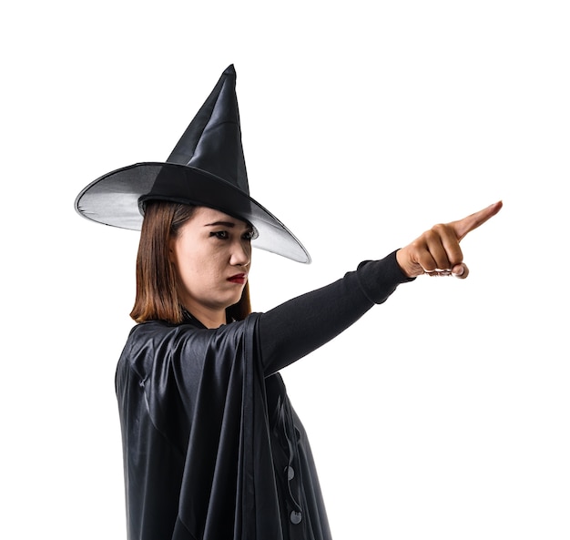 Portrait of woman in black Scary witch halloween costume with hat