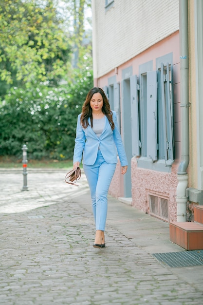 Portrait of a woman in a blue suit