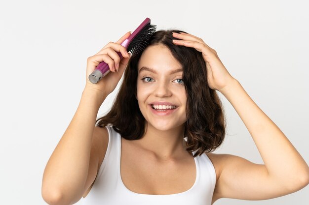 portrait woman brushing hair