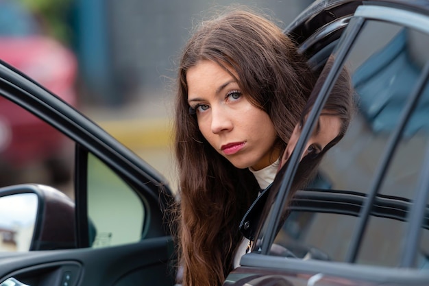 portrait of woman in car