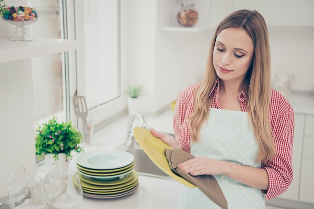 portrait woman cleaning the house