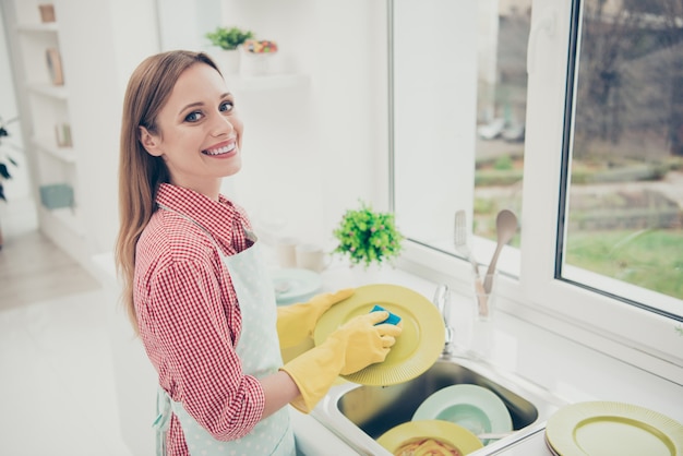 portrait woman cleaning the house