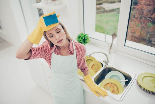 Portrait woman cleaning the house