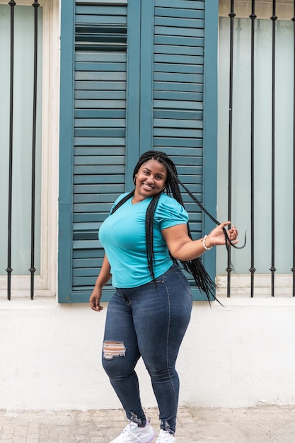 Portrait of woman dancing in the street