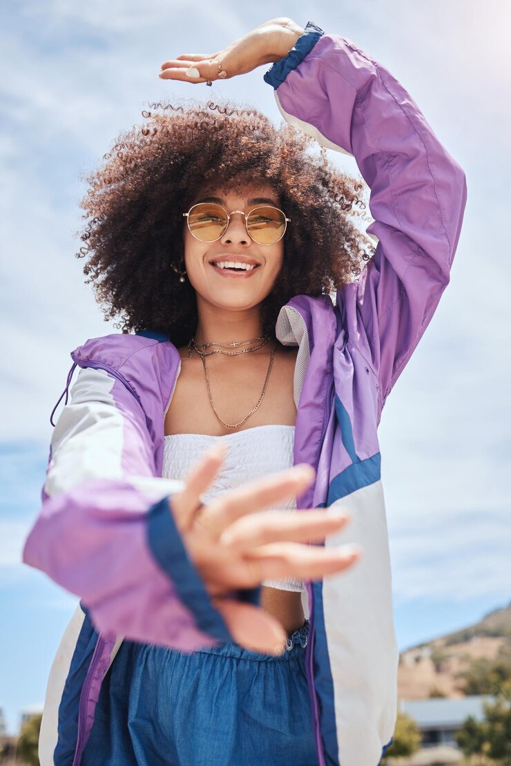 Photo portrait woman and fashion with sunglasses for attitude confidence and designer clothing stylish african girl and accessories with jacket for outfit trendy urban and edgy gen z in california