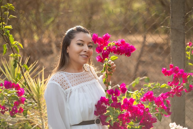 Portrait of a woman in a garden