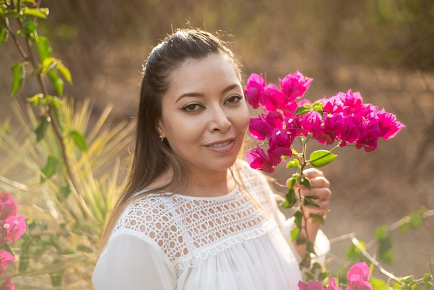 Portrait of a woman in a garden