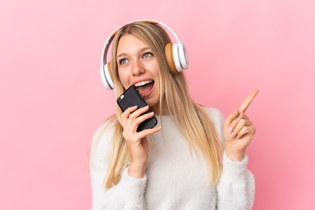 portrait woman listening music