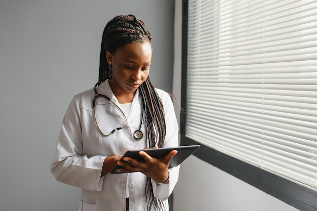 Portrait of woman medical doctor in hospital