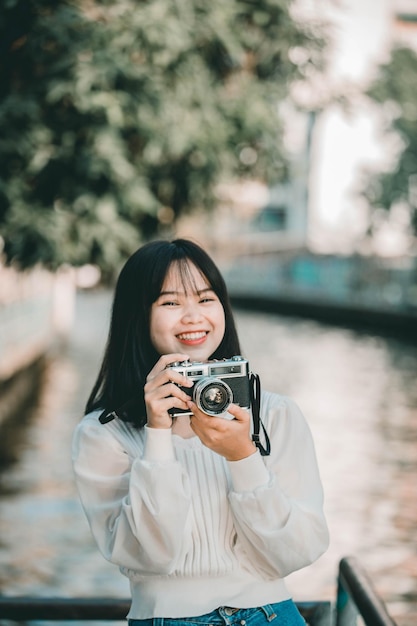 portrait of woman photographing