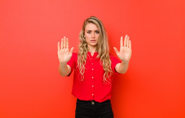 portrait of a woman on a red background