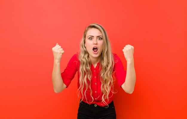 portrait of a woman on a red background