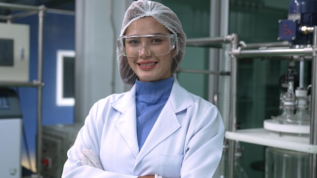 Portrait of a woman scientist in uniform working in curative laboratory