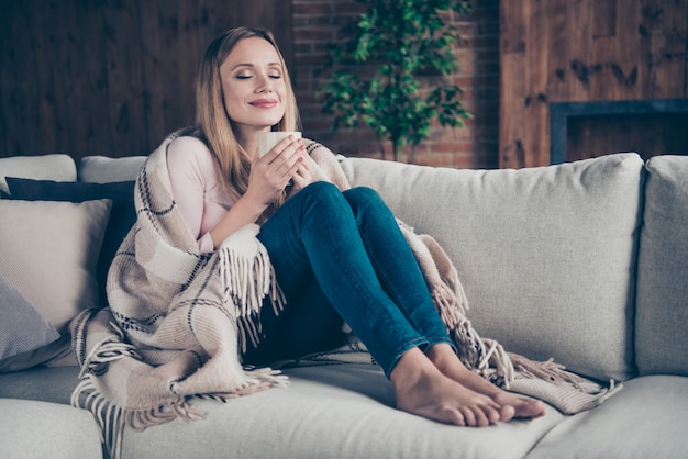 portrait woman sitting on couch