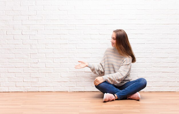 portrait of a woman sitting on a floor