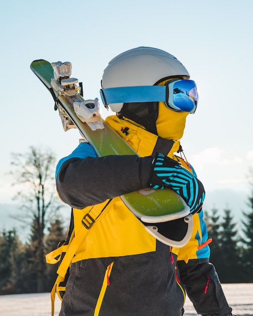 Portrait of woman skier on the hill winter activities