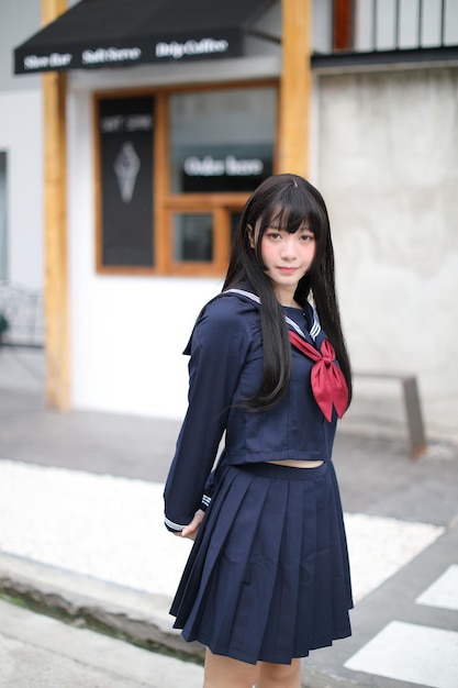 Photo portrait of woman standing outdoors