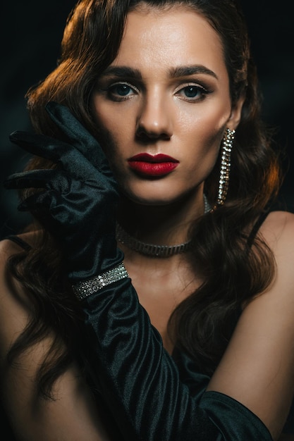 Portrait of a woman in the style of a classic retro Hollywood movie of the 1950s Elegant young girl with a stylish hairstyle and makeup