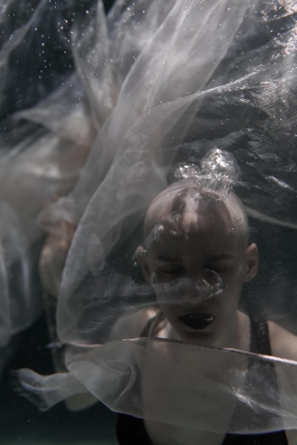 portrait of woman swimming in sea