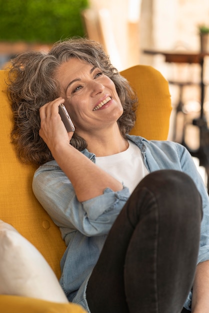 Portrait woman talking on mobile