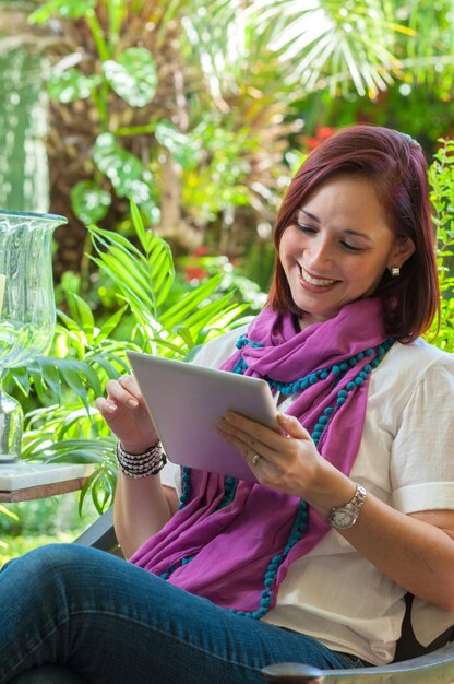 Portrait of woman using tablet