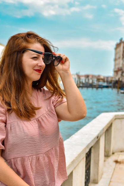 portrait woman walking in the city of Venice