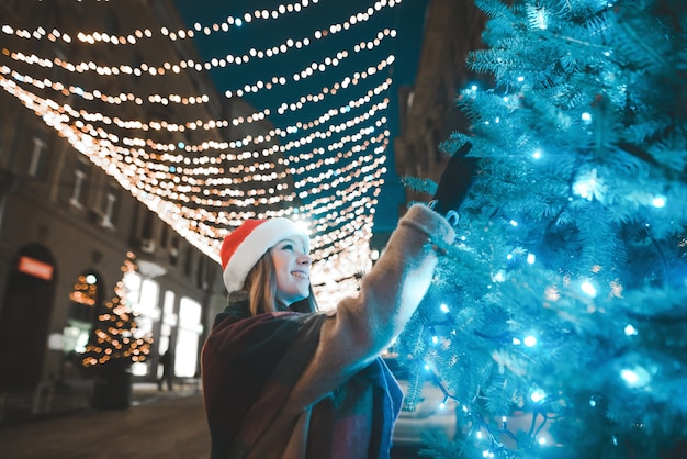 Photo portrait woman wearing santa hat