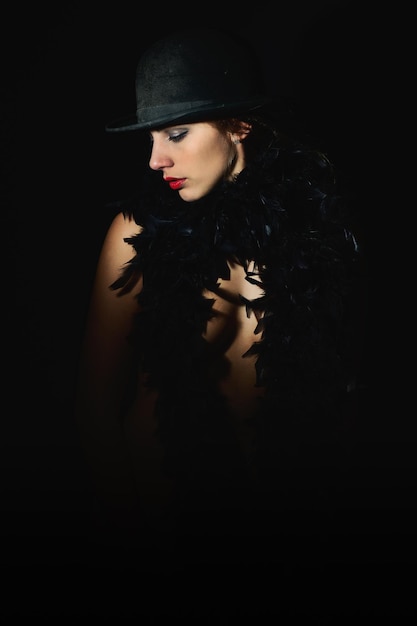 Portrait of woman with black hat