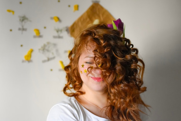 portrait of a woman with curly hair