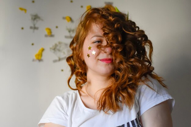 portrait of a woman with curly hair